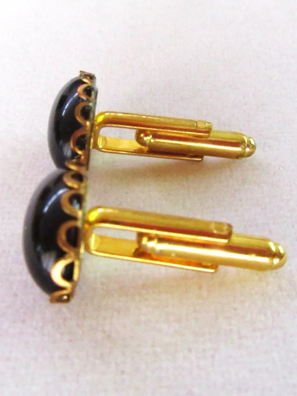 Cuff links with tiger eye stones in new brass settings